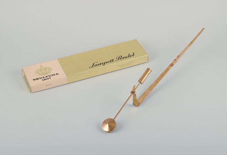 Skultuna, Sweden. "Lampett" wall-mounted candle holder in brass with original 
box.