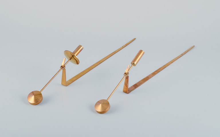 Skultuna, Sweden. A pair of "Lampett" wall-mounted candle holders in brass.