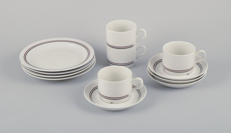 Rörstrand, Sweden. Coffee service in glazed porcelain consisting of four coffee 
cups, four saucers, and four plates.