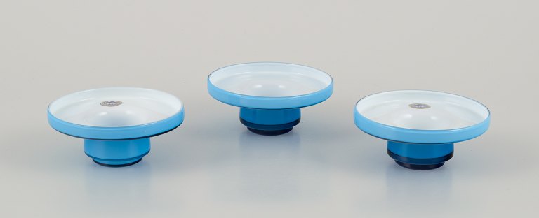 Michael Bang for Holmegaard. Three "Palet" candle holders in turquoise 
mouth-blown art glass.