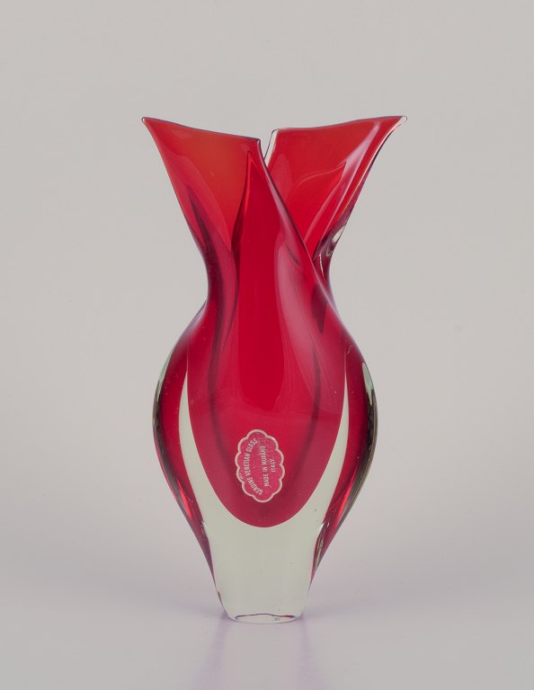 Murano, Italy. Art glass vase in clear and red glass.