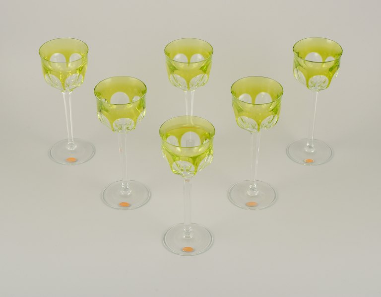 Moser, Czech Republic.
A set of six tall white wine glasses in clear and green glass.