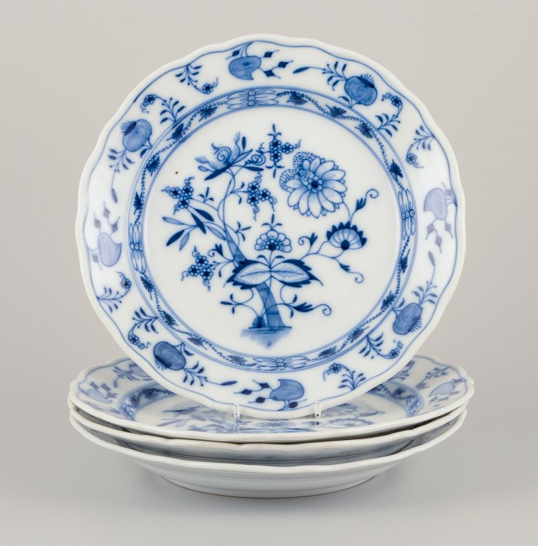 Stadt Meissen, Germany. A set of four Blue Onion-patterned dinner plates.