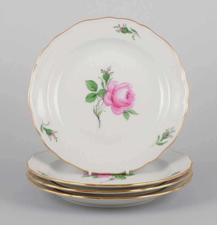 Meissen, Germany. Four lunch plates with a motif of a pink rose.