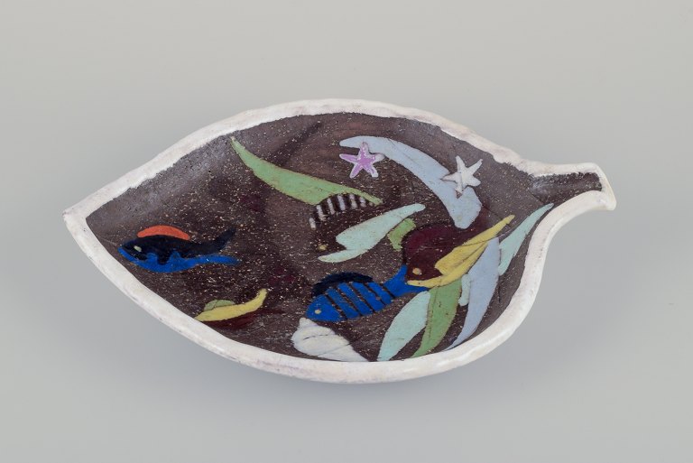 Anna-Lisa Thomson for Upsala-Ekeby.
Large ceramic dish with swimming fish, starfish, and sea plants.