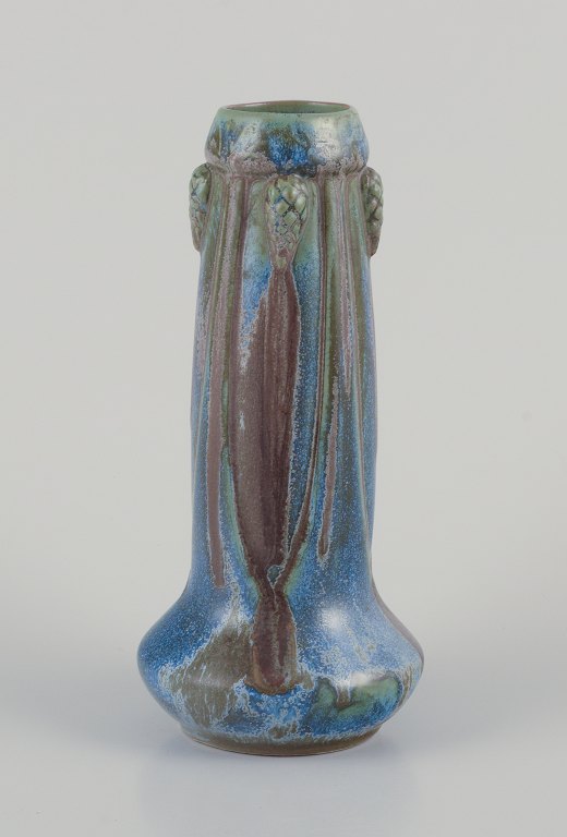 French ceramic vase with glaze in blue, green, and brown shades.