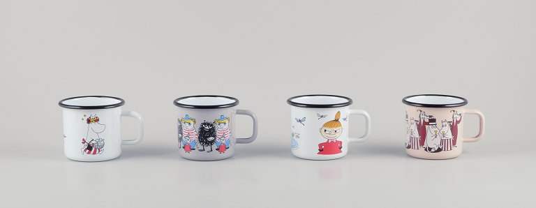 Muurla, Finland. 
Four enamel mugs with different motifs from the Moomin troll universe.