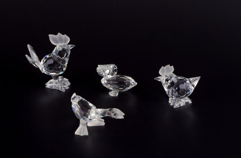 Swarovski, Austria.
Four miniature figures in faceted cut crystal glass.