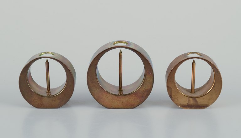 Arthur Pe for Kolbäck, Sweden.
Three small brass candlesticks.
