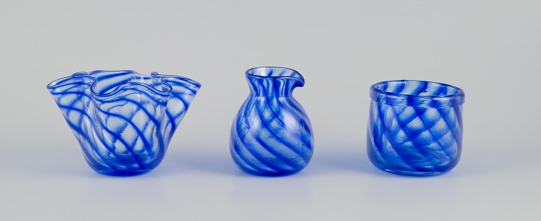 Glashytten, Nykøbing Sjælland, Denmark
Bowl, vase, and pitcher in mouth-blown art glass. Blue hues.