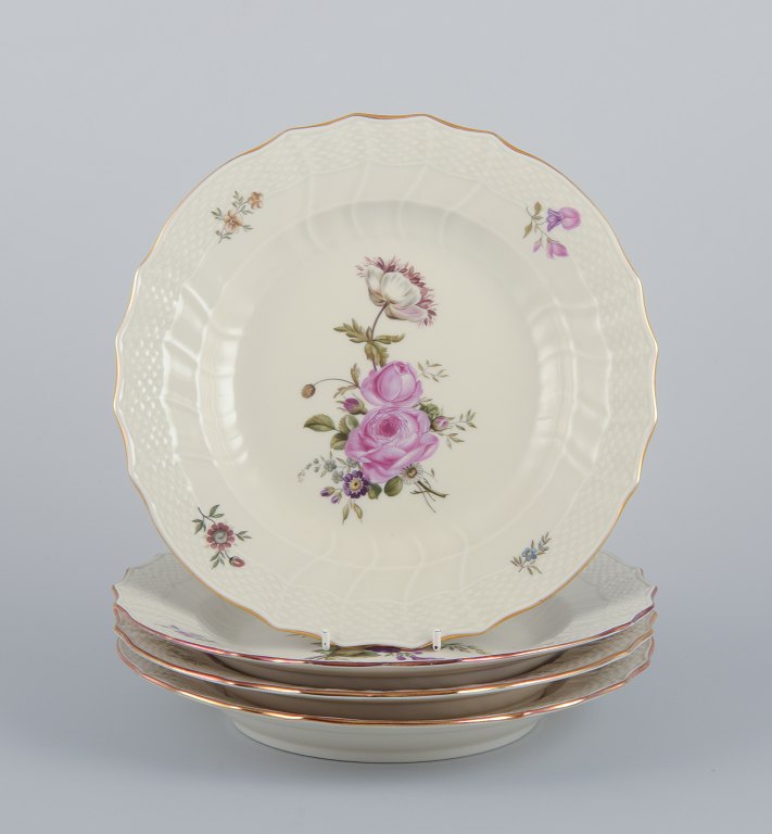 Royal Copenhagen "Frijsenborg". Four dinner plates in hand-painted porcelain.