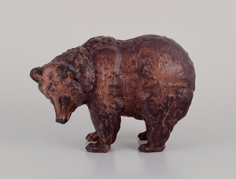 Jeanne Grut for Royal Copenhagen Aluminia faience.
Large figurine of standing brown bear.