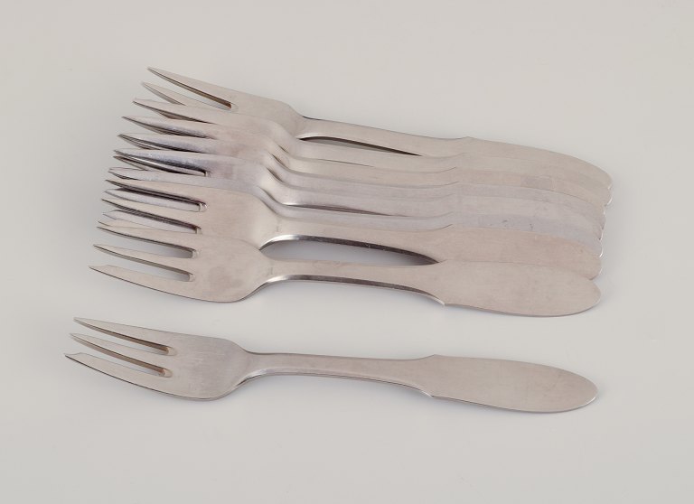 Georg Jensen "Mitra," a set of nine cake forks.
