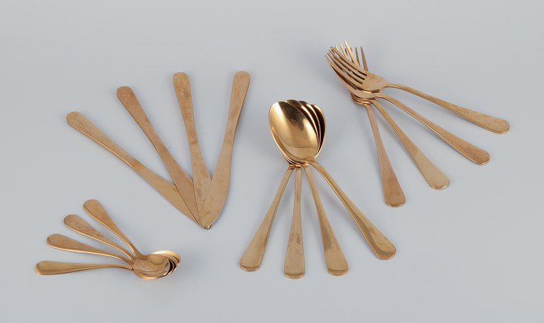 Lagerhaus, Sweden. Dinner set in brushed brass for four people.