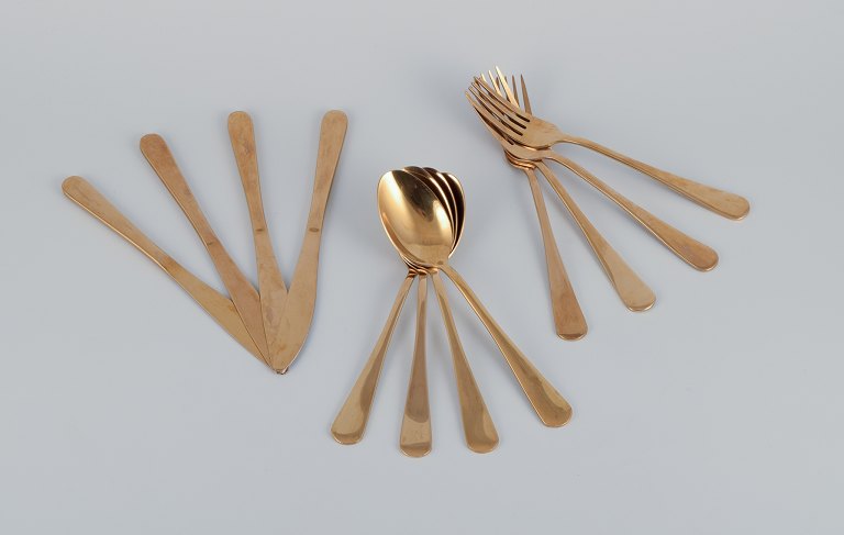 Lagerhaus, Sweden. Dinner set in brushed brass for four people.