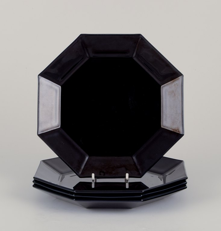 Arcoroc, France.
A set of four octagonal plates in black porcelain.