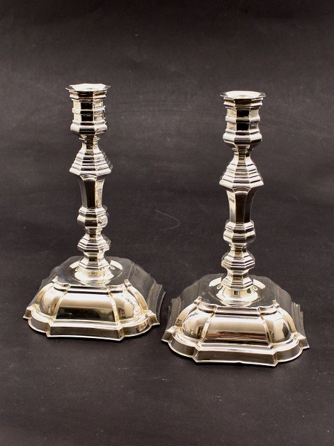 A pair of sterling silver candlesticks