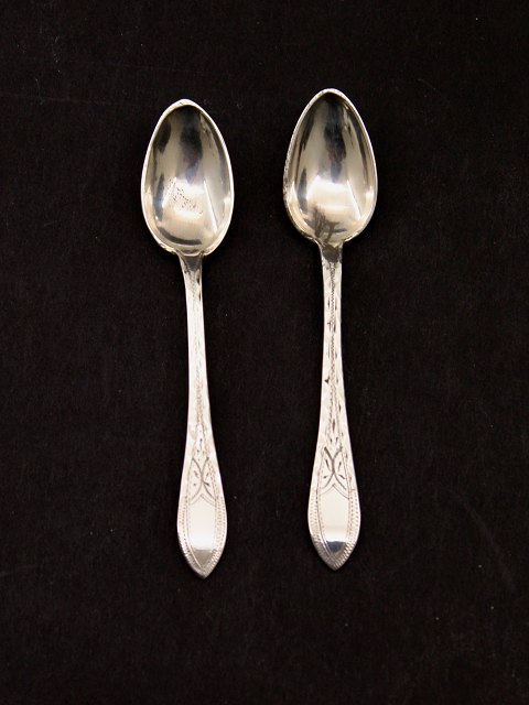 A pair of Empire silver salt spoons