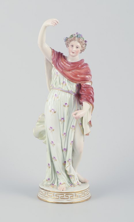 Meissen, Germany.
Porcelain figure of flora.