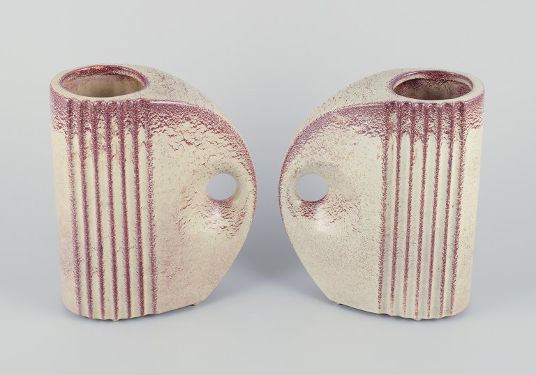 French ceramicist. A pair of Art Deco jug-shaped vases with handles.