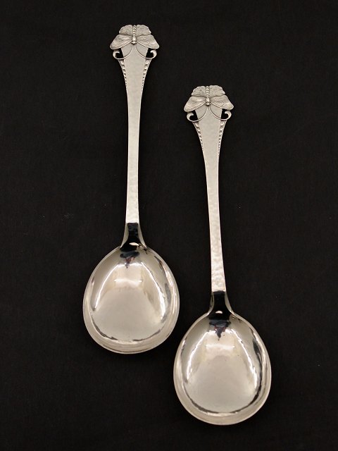 Three-cornered silver spoon with butterfly