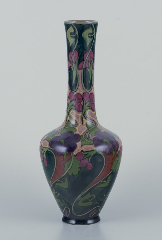 Zuid-Holland, Gouda. Unique Art Nouveau vase in glazed ceramic with hand-painted 
floral motifs.