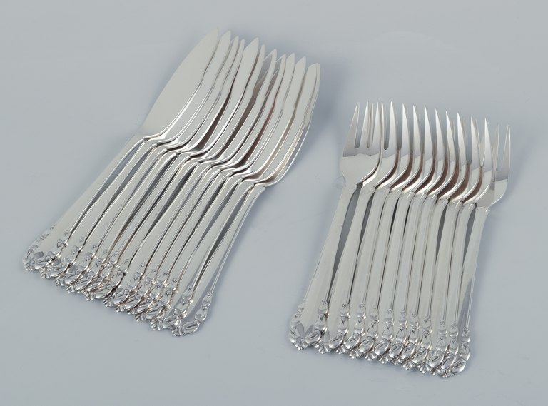 Georg Jensen, complete twelve-person ‘Lily of the Valley’ fish cutlery.