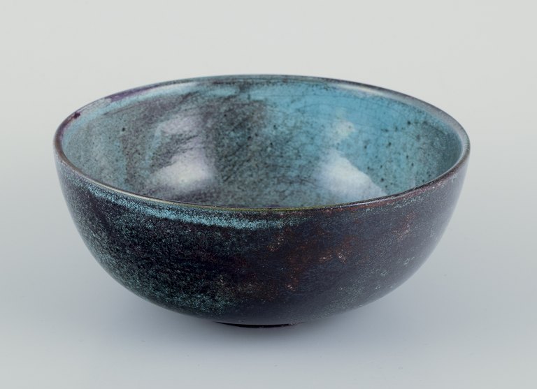 Svend Hammershøi for Kähler. 
Ceramic bowl with black-green double glaze.