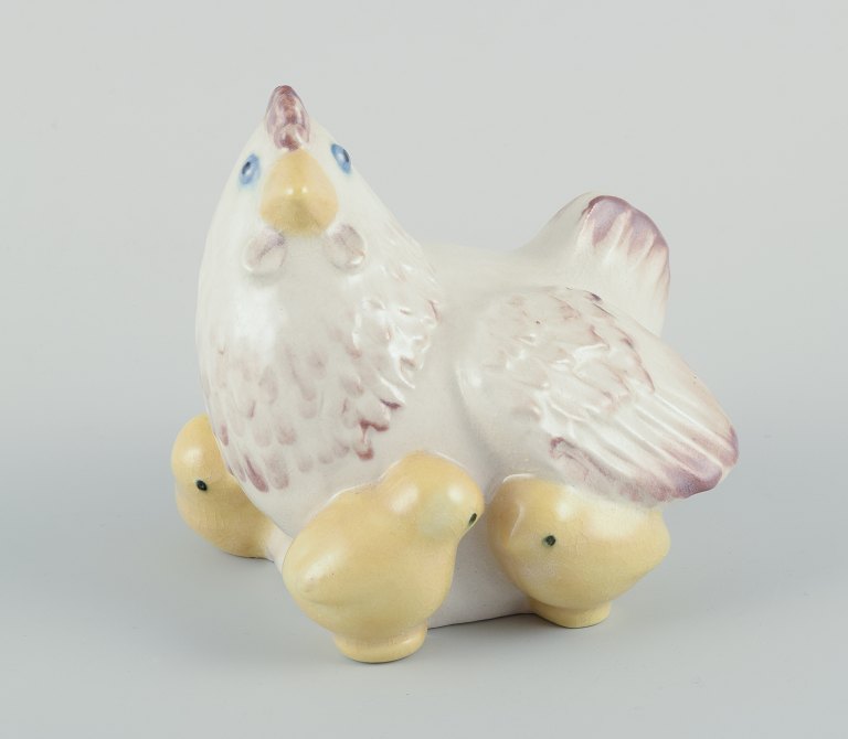 Kähler ceramic figure in the shape of a hen with chicks.