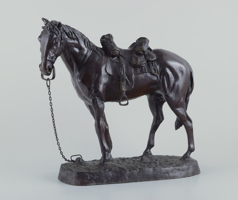 Unknown sculptor. Large sculpture in the shape of a horse on a plinth.