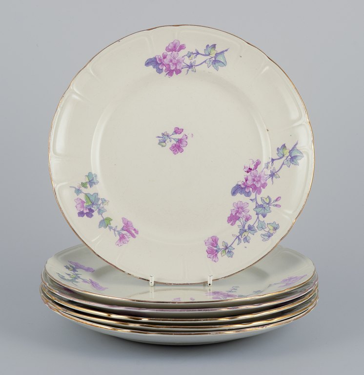 Gustafsberg, Sweden.
A set of six ‘Geranium’ faience dinner plates.