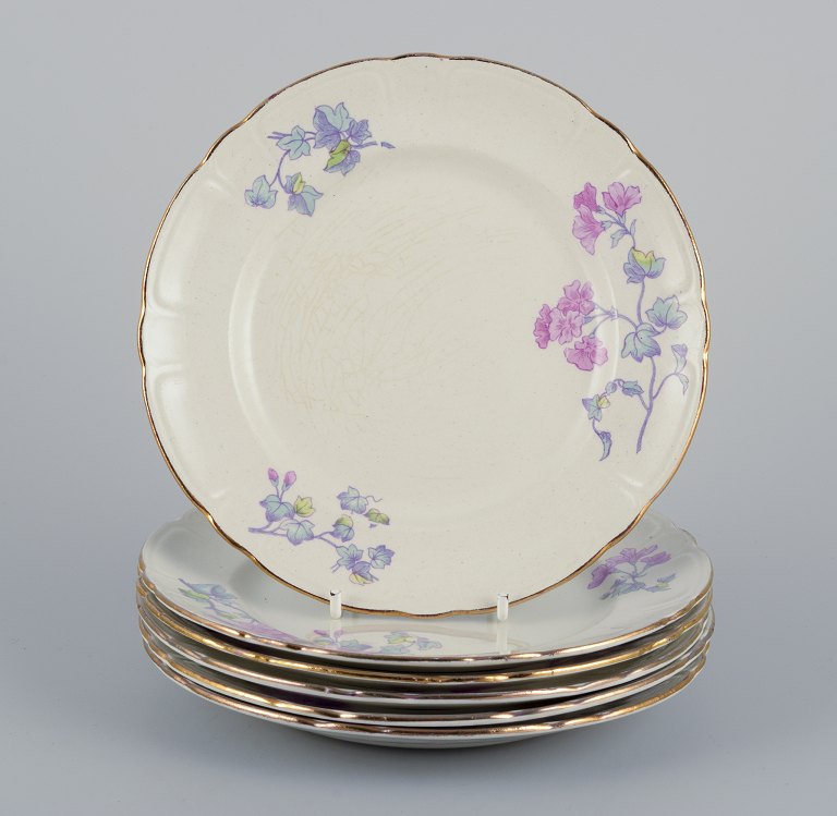 Gustafsberg, Sweden.
A set of six flat earthenware ‘Geranium’ plates.