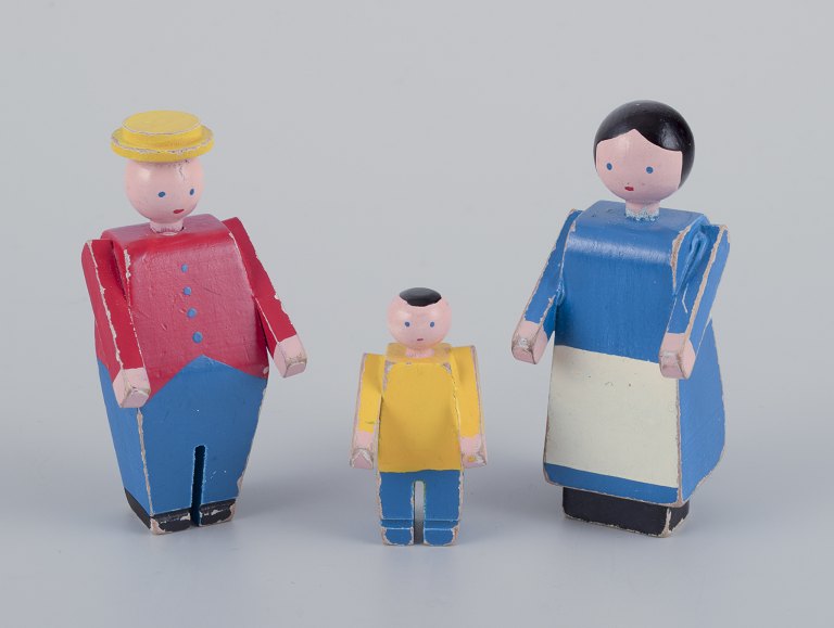 Kay Bojesen, Danish designer.
Three early wooden figures of farmer, farmer woman and farmer boy.