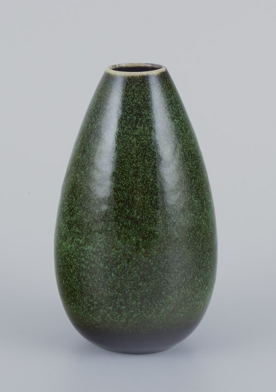 Carl Harry Stålhane for Rörstrand.
Ceramic vase with glaze in green and black tones.