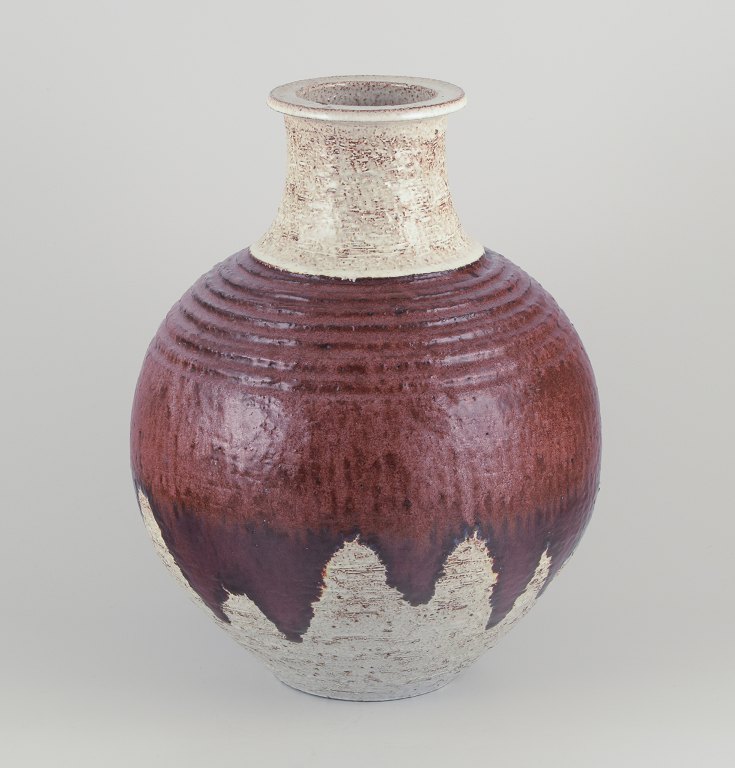 European studio ceramicist.
Unique floor vase in ceramic.