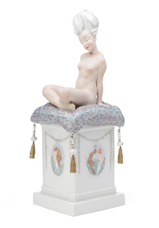 Gerhard Henning for Royal Copenhagen. Porcelain bobblehead doll ‘Ane Mari’ 
decorated with overglaze and gold.