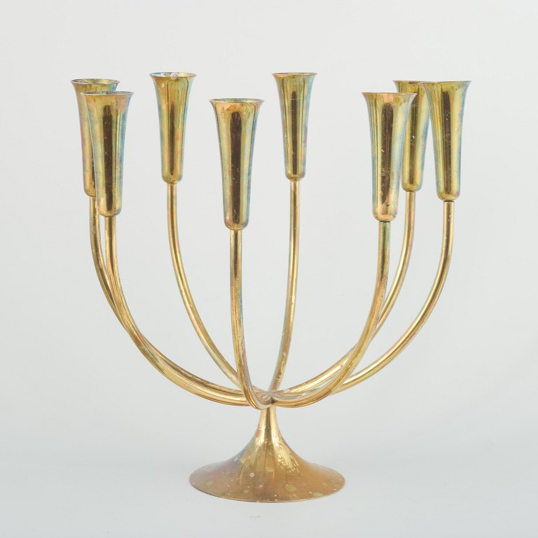 Danish Designer
Eight-armed candelabrum, 1970s.
Brass candelabrum with eight curved arms
