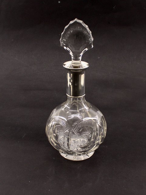 Crystal decanter with silver mounting