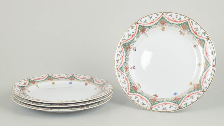 Royal Copenhagen Christmas Joy, set of four plates.