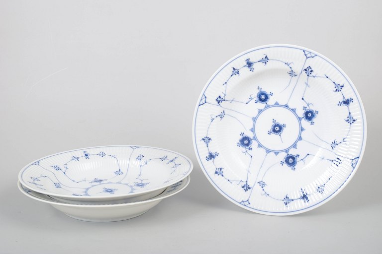 Royal Copenhagen Blue Fluted Plain, set of three deep plates.