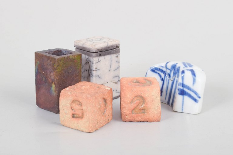 Set of five miniature vessels.