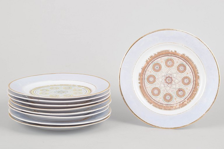 Set of nine Aluminia Porcelain Plates.