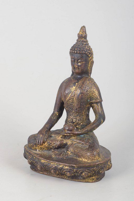 Gilt bronze Buddha figure.