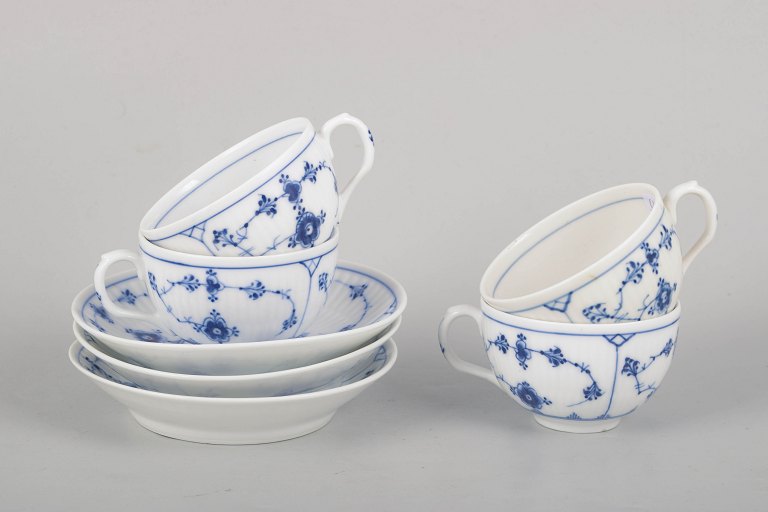 Royal Copenhagen Blue Fluted Plain, set of four coffee cups with matching saucers.