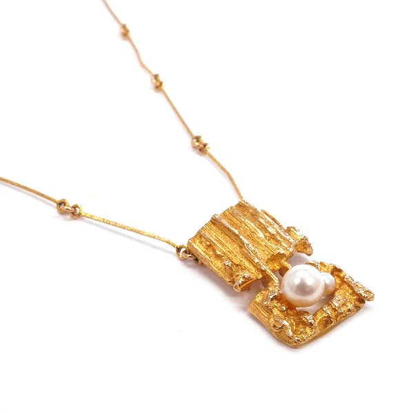 Lapponia Halskette aus 14kt Gold von Weckström 1971. L: 45cm. Hänger: 28x16mm