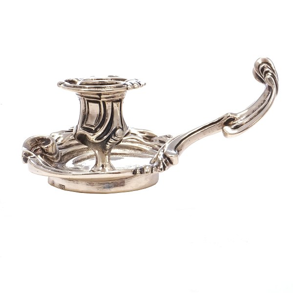 Silver candlestick by A. Michelsen, Copenhagen, dated 1891. H: 5,4cm. L: 14cm. W: 250gr