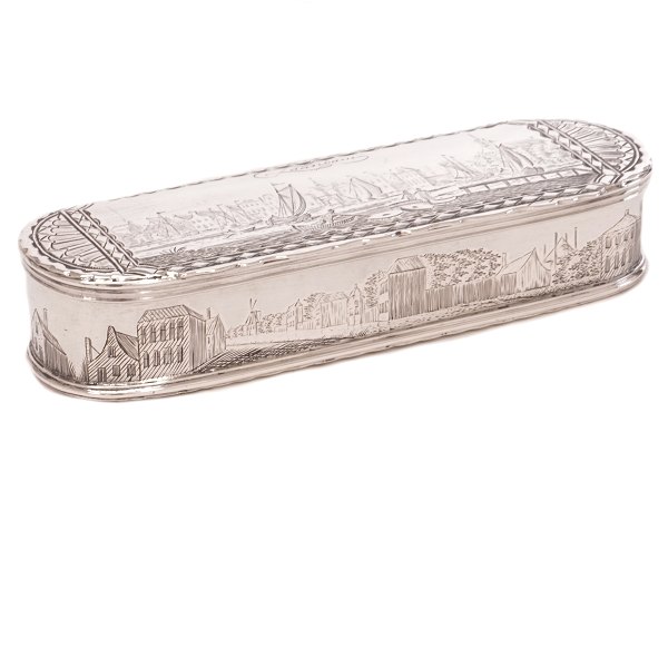 Early, rare Dutch silver tobacco box by Isaac Lingenaar, Amsterdam, circa 1751. Richly decorated with a whaling scene and a landscape. H: 3.4cm. L: 16cm. Wt: 218gr