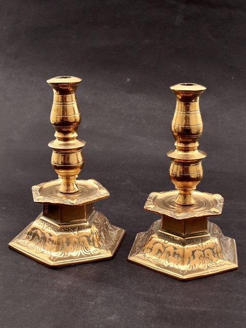A pair of heavy vintage brass candlesticks